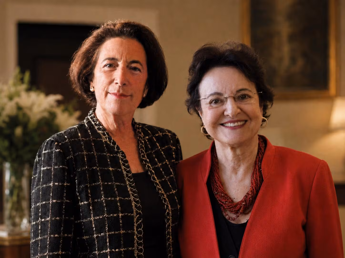 Dos personas sonriendo a la foto